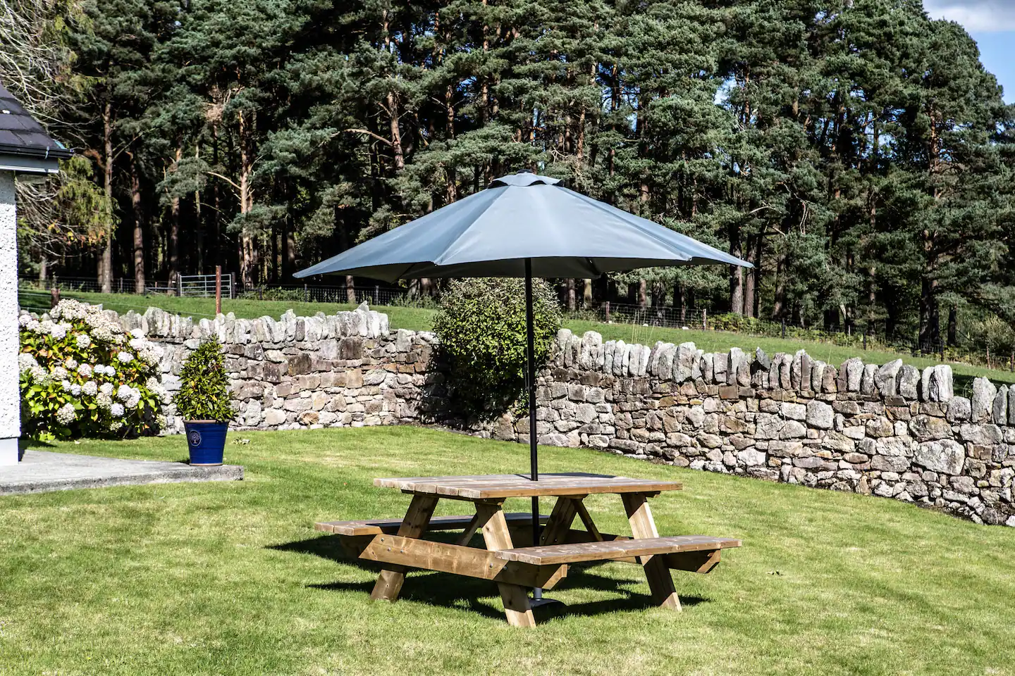 A picnic table on the lawn outside of Johns Dairy Self Catering Cottage Tipperary